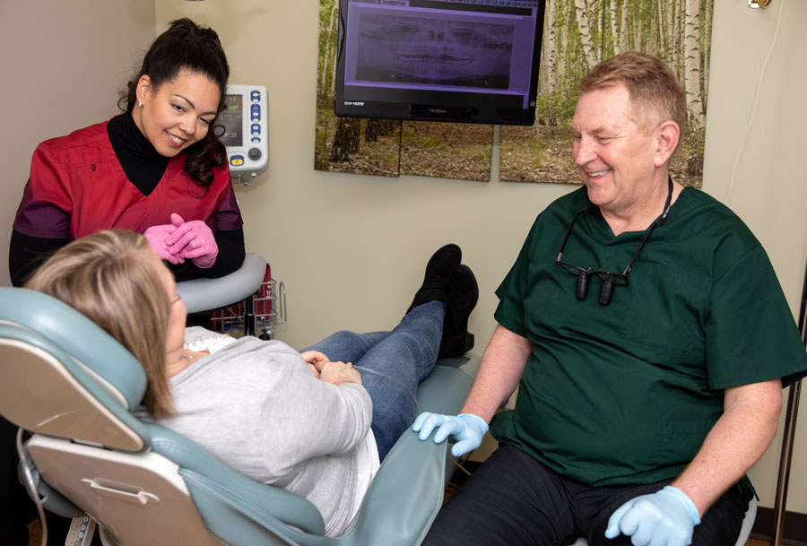 dr connelly discussing iv sedation with patient St. Johns, MI