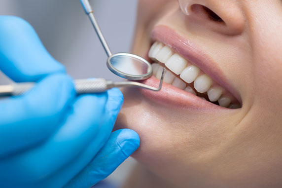 patient undergoing dental procedure St. Johns, MI