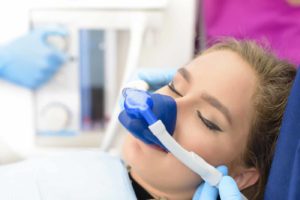 dental patient under sedation to help her with her anxiety