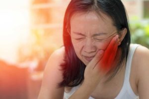 a dental patient in need of treatment for her TMJ Disorder