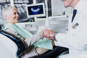 Dental Implants Patients Smiling After Their Procedure